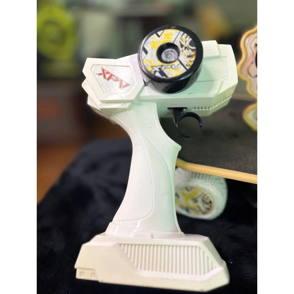 XPV Remote Control Skateboard Flaming Skull Graphic RC Toy with Remote White
